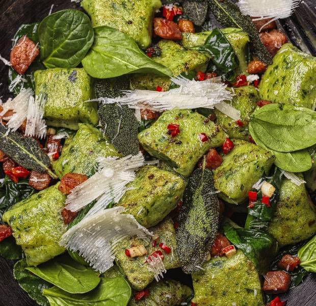Spinach gnocchi with pancetta and sage