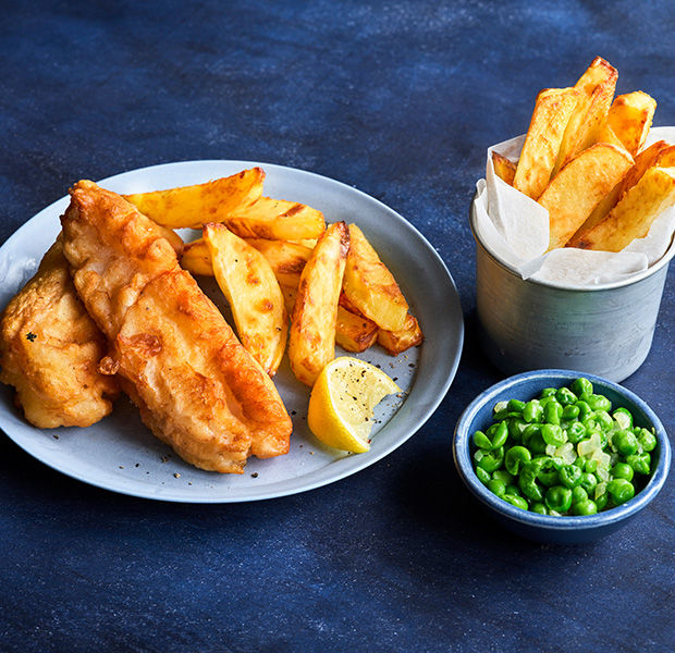 Salt and pepper fish goujons & chips with crushed peas
