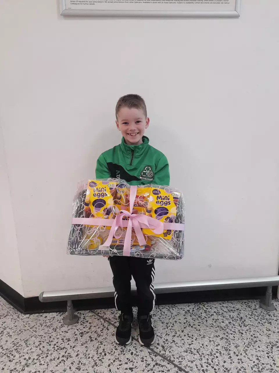 Sam from Tingley athletic football club collected Easter hamper for his team  | Asda Morley