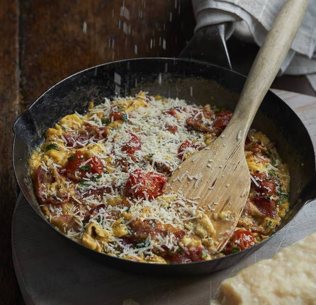 Parmesan scrambled eggs with pancetta and cherry tomatoes