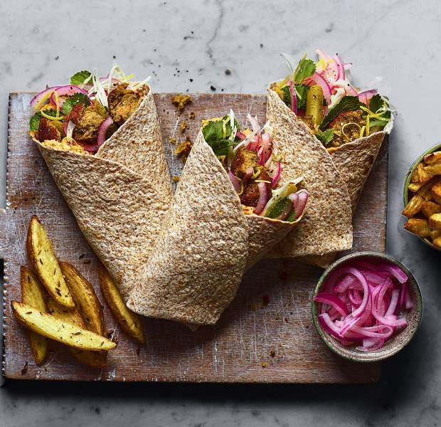 Vegan falafel wraps with spiced wedges and pickles