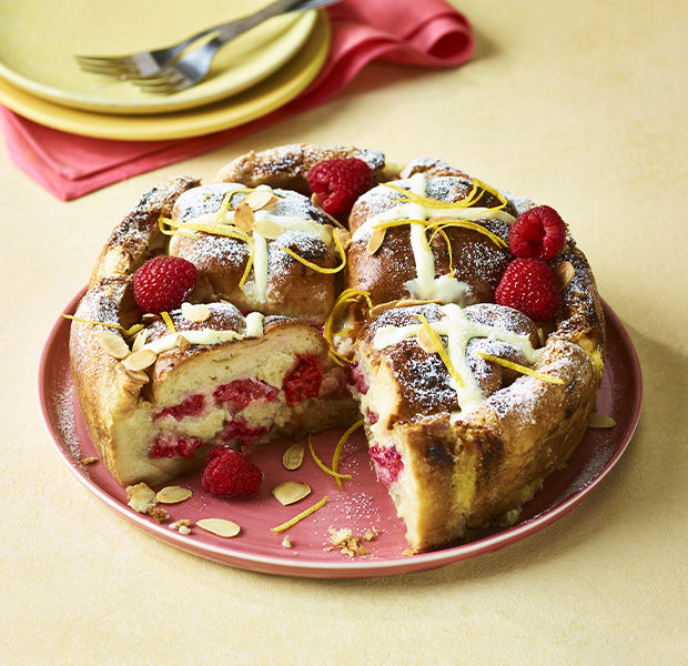 White chocolate, lemon & raspberry hot cross bun cake