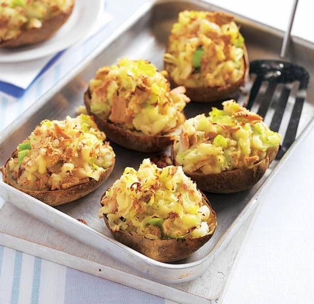 Baked potatoes stuffed with tuna and cheese