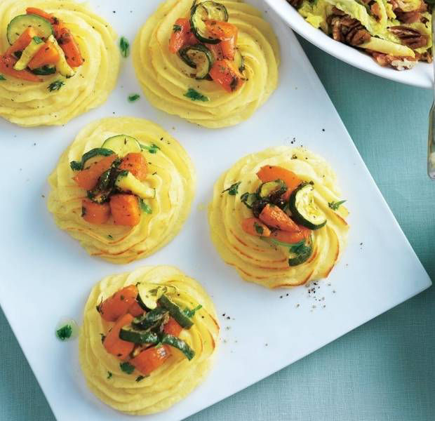 Potato nests with carrots, courgettes and herb oil