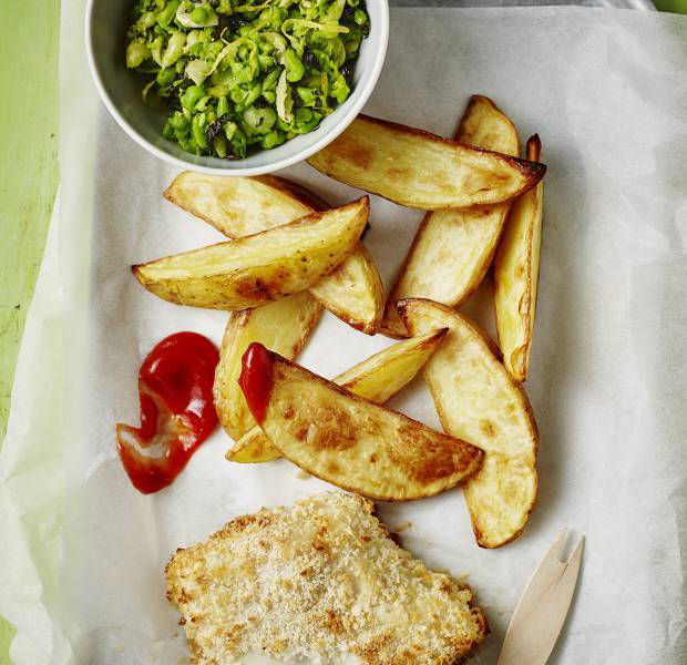 Baked fish and chips with mushy peas