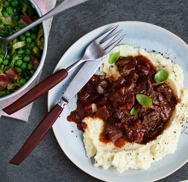 Slow-cooked beef ragu with cauliflower mash and peas