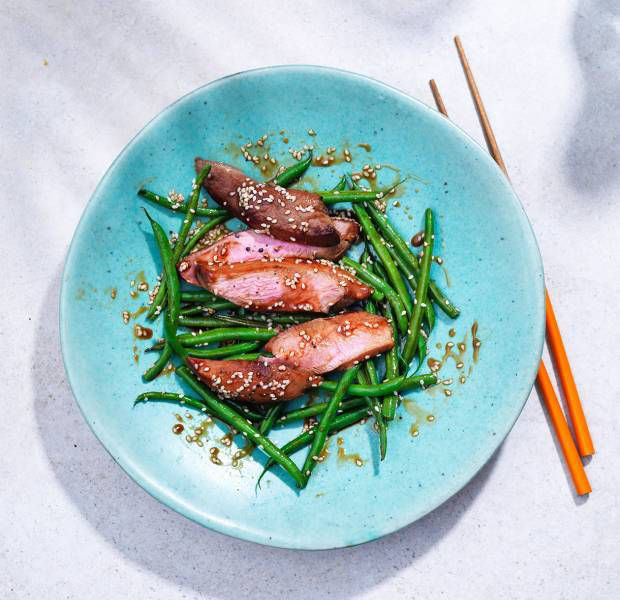 Sticky sesame duck with beans