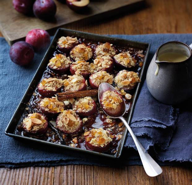 Sloe gin-soaked plums with oat and nut crumble
