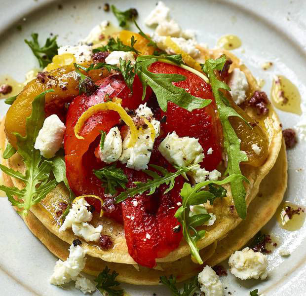 Big blinis with roasted peppers, rocket and feta