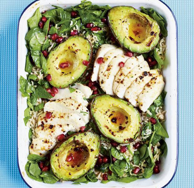Avocado and chicken salad with pomegranates and brown rice