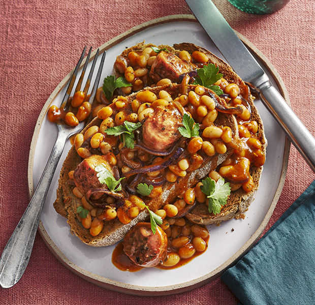 Smoky sausages and beans on toast
