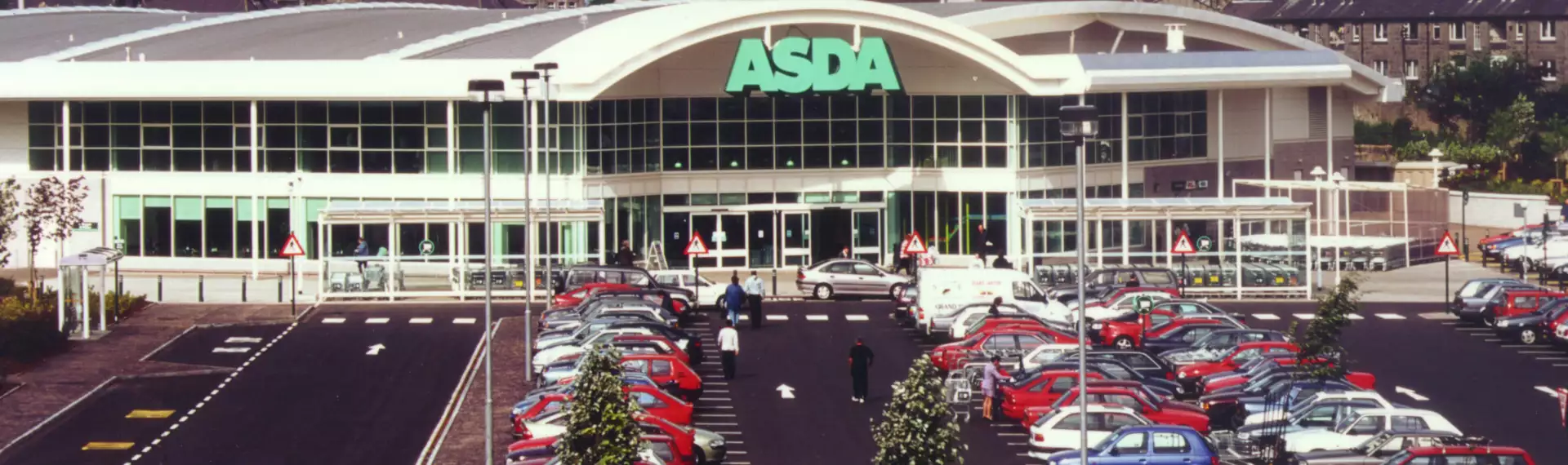 Older Asda store exterior and late 80's-90's cars in the car park