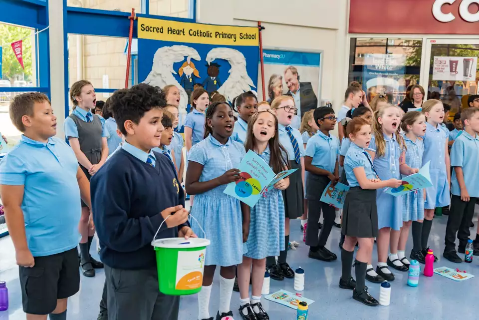 School choir performing at the NHS 70th birthday event