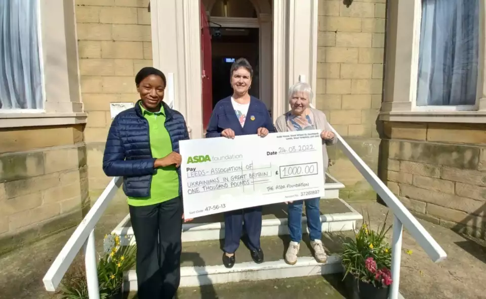 Sarah John from Asda Killingbeck donates £1,000 from the Asda Foundation to Leeds Association of Ukrainians in Great Britain